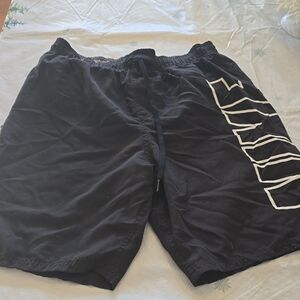 Nike Black Mesh Shorts with White Swoosh
